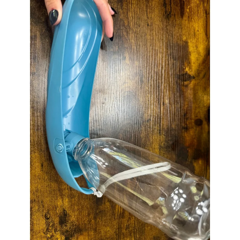 Plastic Pet Traveling Water Bottle with Wrist Strap, used once